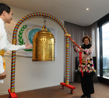 The speaker of the 63rd United Nations DPI/NGO Annual Conference from the International Health Awareness Network , Dr. Sorosh Roshan rings the Bell of World Love and Peace and makes the promise of peace and love: We wish peace and love for the human family all through the world. 